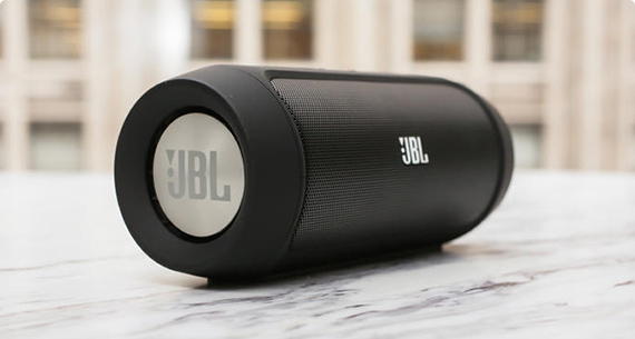 A JBL Charge bluetooth speaker.